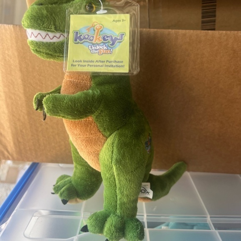 T-Rex green and yellow plush toy Animal kookeys unlock the fun